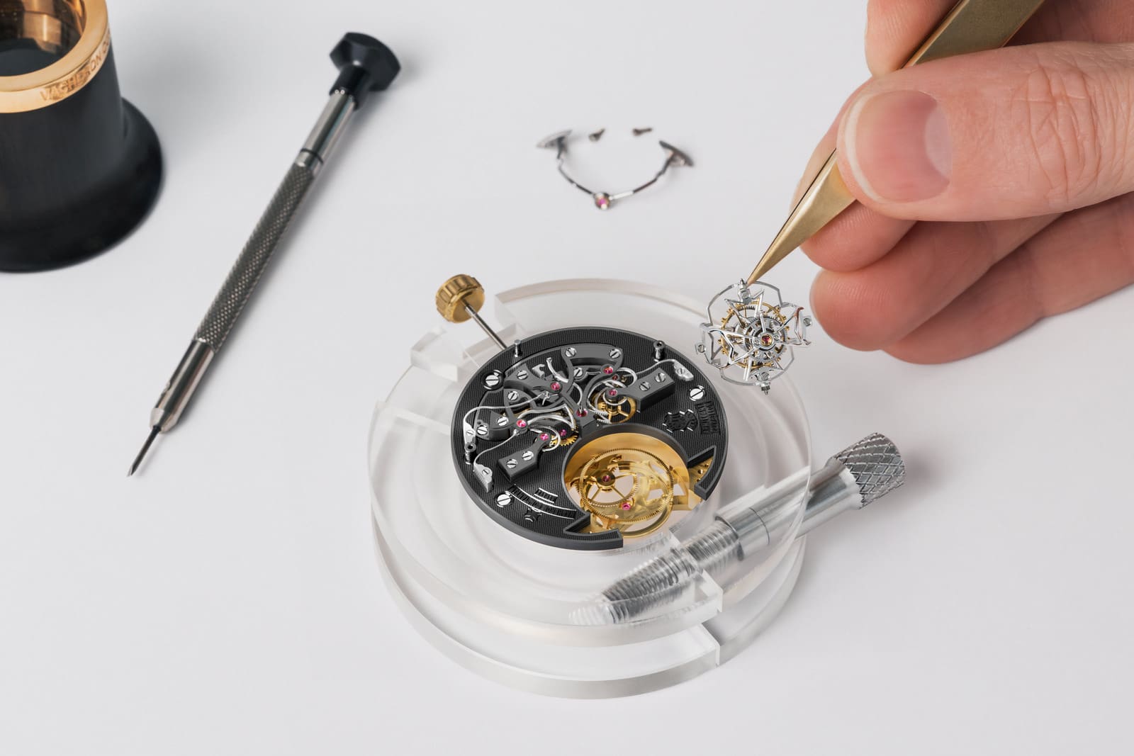 A Vacheron Constantin watchmaker crafts a timepiece