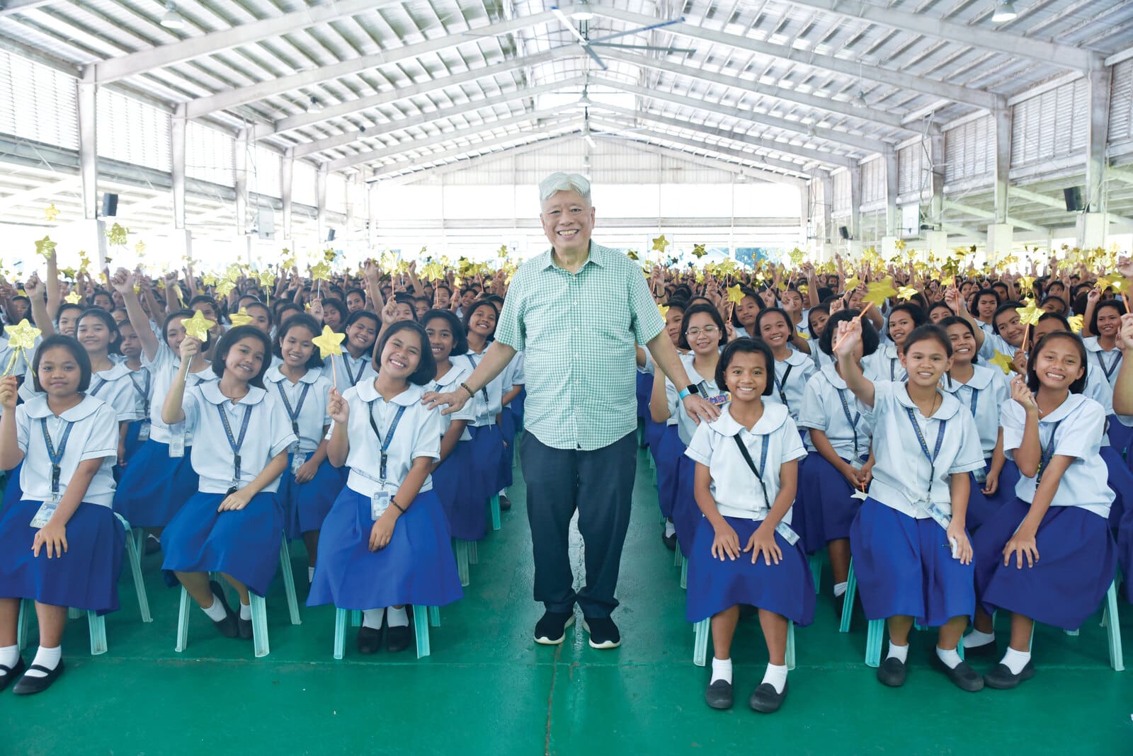 Charlie Rufino with students of the Sisters of Mary Schools