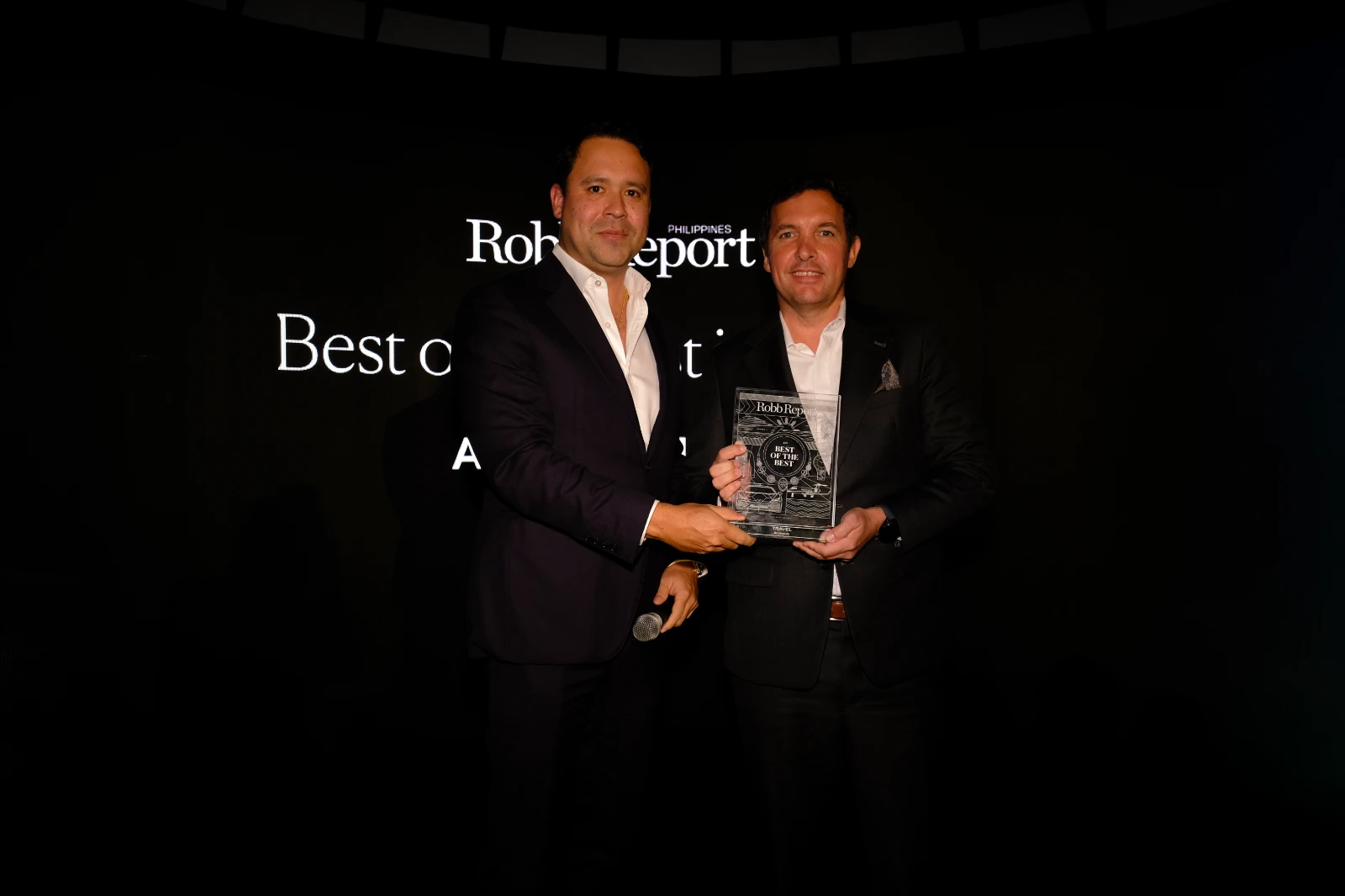 Romain Gissot received the Best of the Best Award on behalf of Amanpulo, for Travel. Jacques Christophe Branellec presented the award.
