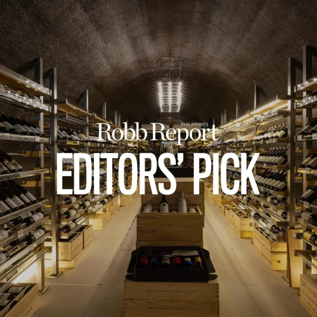 Robb Report PhilippinesEditors' pick feature over a dimly lit wine cellar with bottle racks on both sides