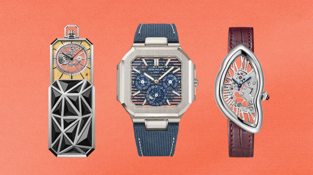 Three luxury watches on an orange background: a skeleton pocket watch on a geometric black stand, a blue‑strap Patek Philippe Nautilus in the center, and a teardrop skeleton watch with a purple strap on the right.