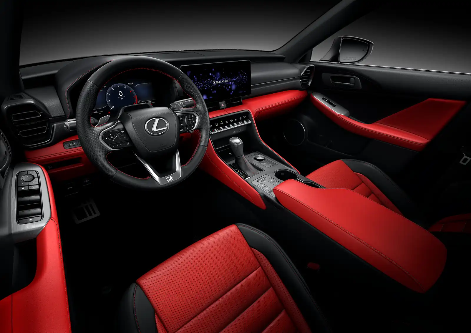 Lexus car interior with red and black leather seats, steering wheel, and center console.