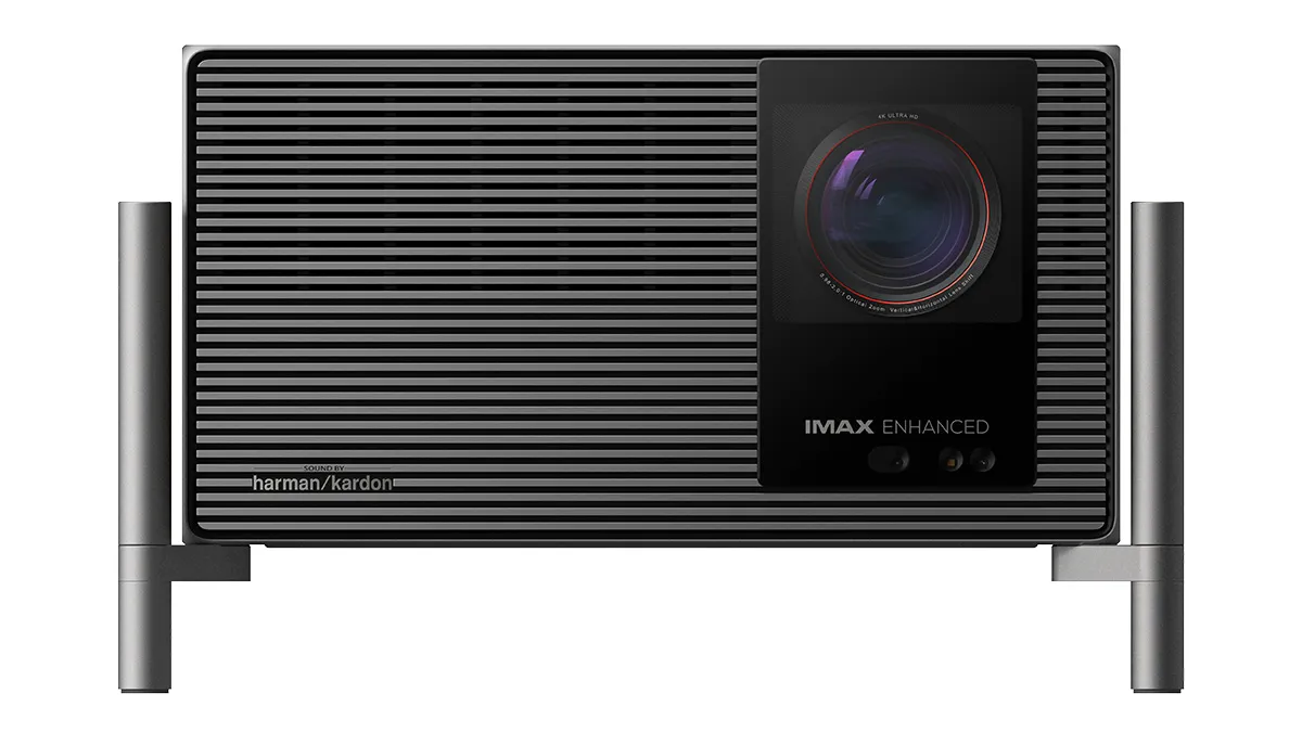 IMAX Enhanced home theater projector with a large front lens and striped black body mounted on a metal stand.