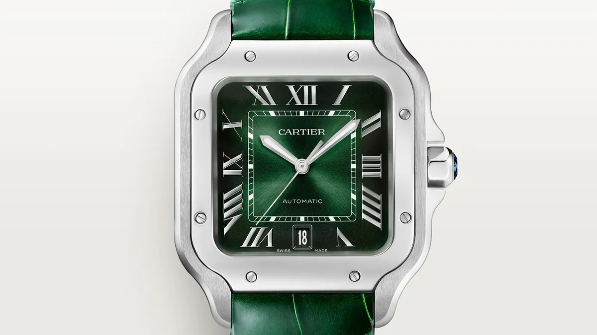 Cartier wristwatch with a green sunburst dial, Roman numerals, stainless steel case, and green leather strap