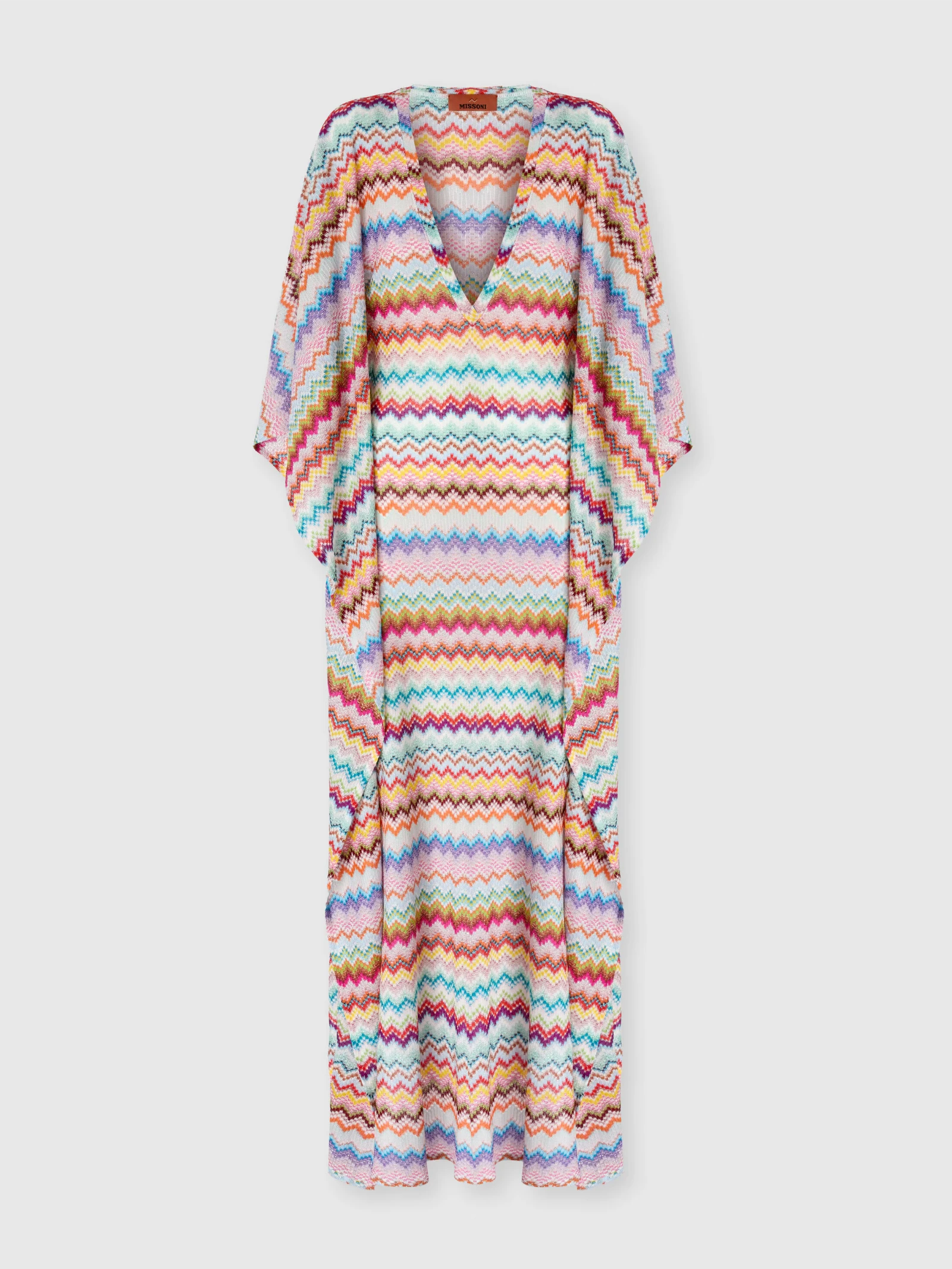 Missoni multicolor chevron knit poncho with a deep V-neck, shown on a light background.