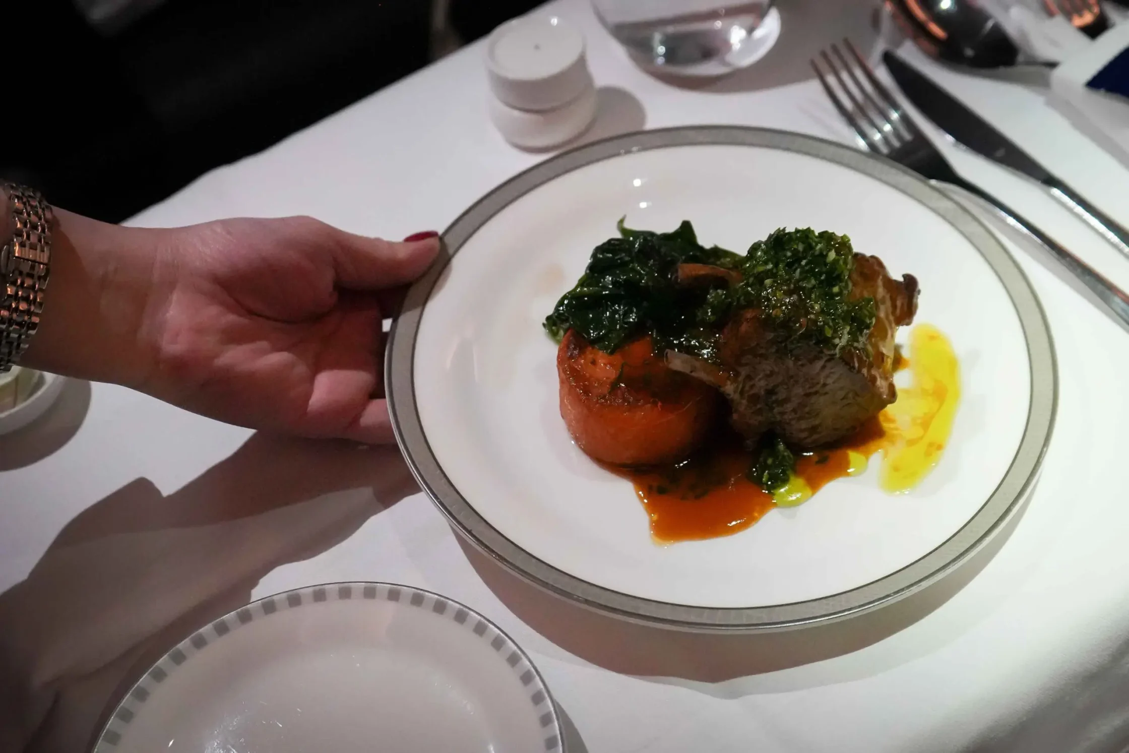 Slow-Roasted-Spring-Lamb-Cutlet-with-Gremolata-and-Rosemary-Jus-by-Monica-Galetti-©-Singapore-Airlines-scaled