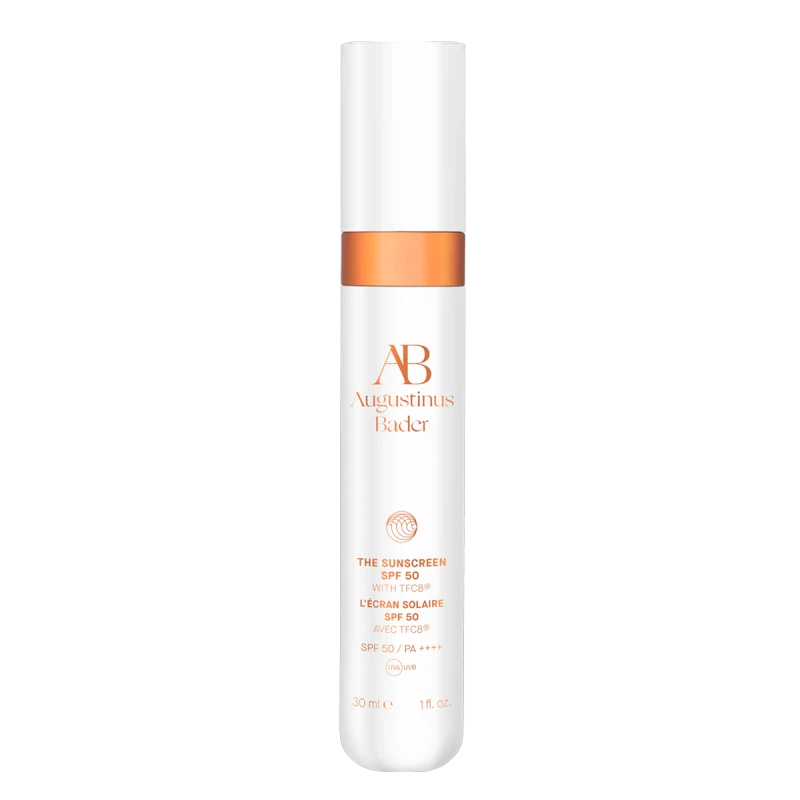 Augustinus Bader The Sunscreen SPF 50 bottle with white body and orange band and logo text visible on frontoar.