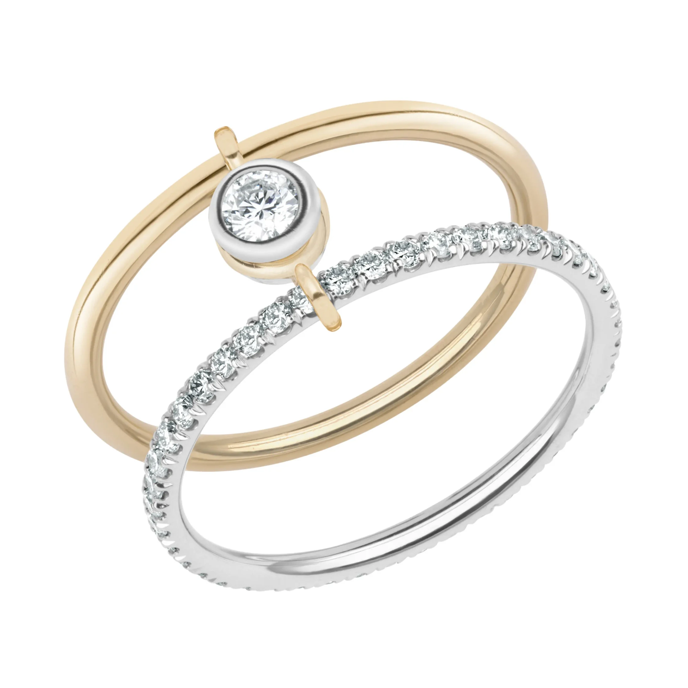 This Chelsea Gabrielle ring allows the center diamond to move around the rings; the bezel-set diamond is also able to rotate horizontally.