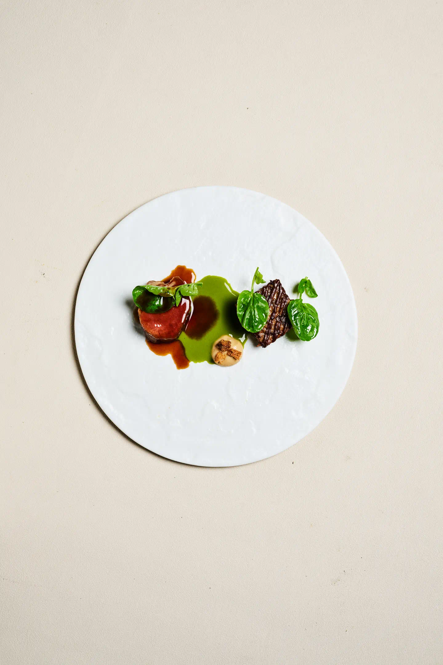 The lamb course has both a tenderloin cut and a terrine. Helm