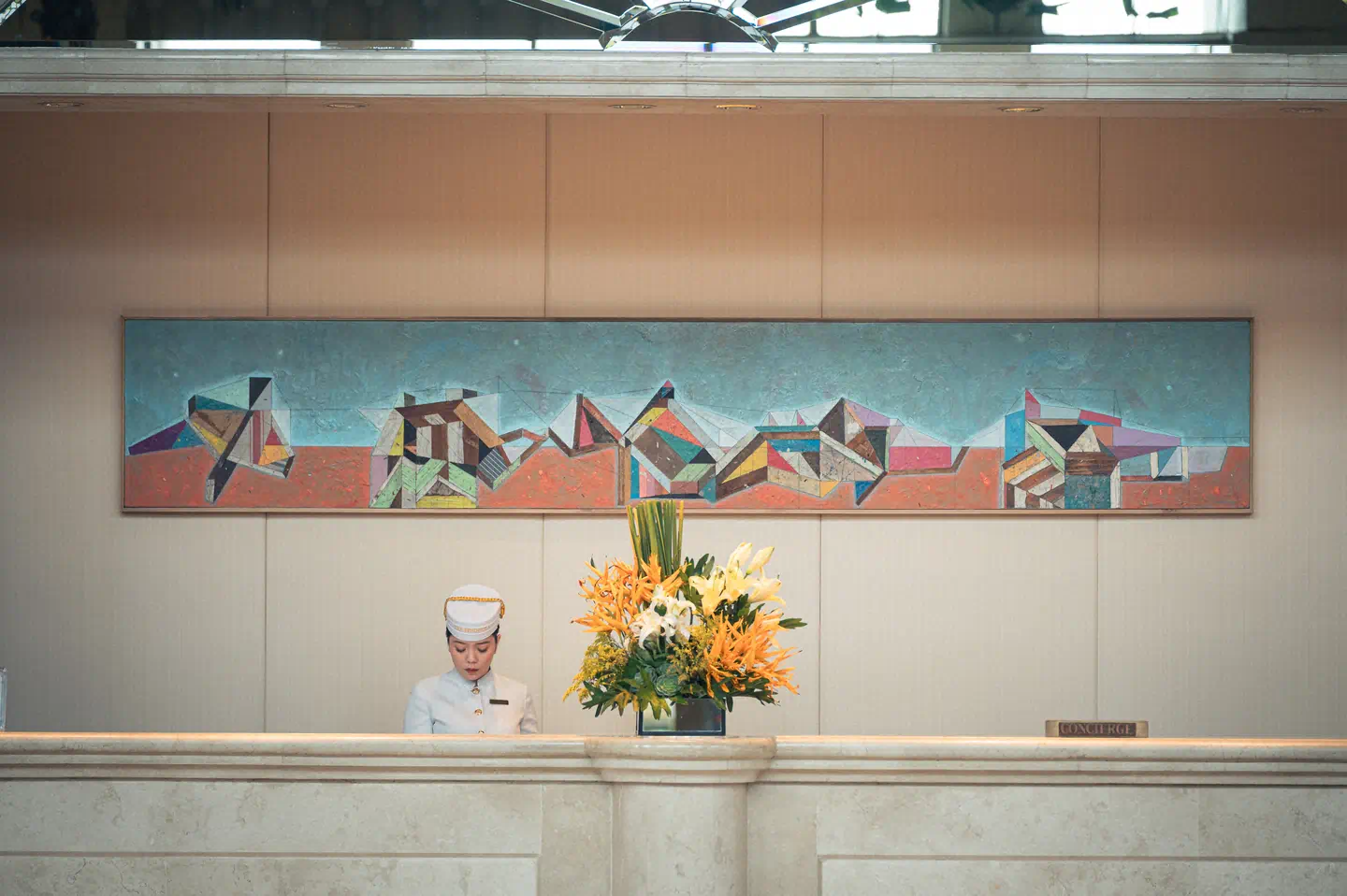 A Demosthenes Campos painting at check-in.