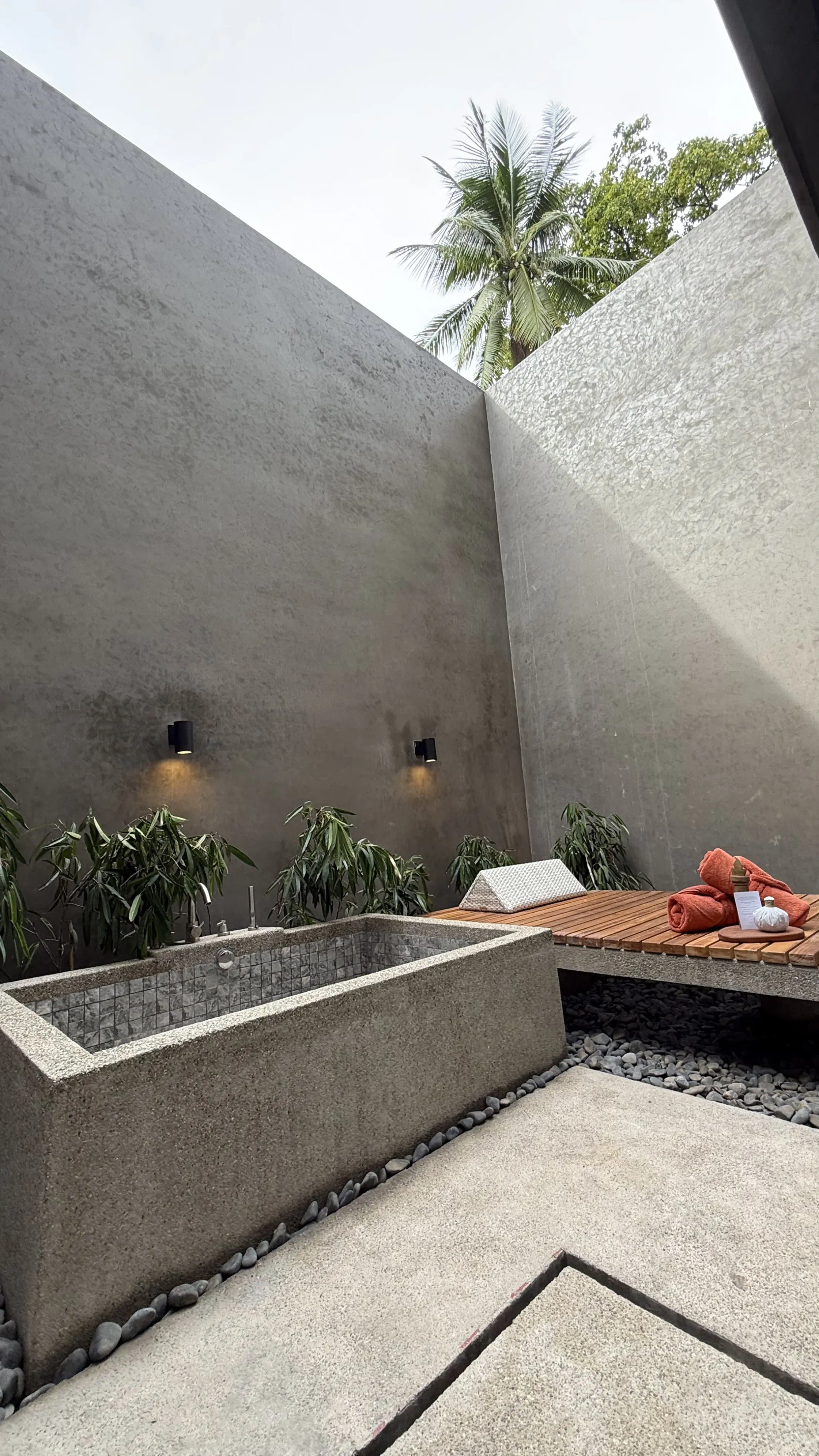 At the rear of the villa is a sunbed, and a tub fitted with salts and herbs sourced from Palawan.