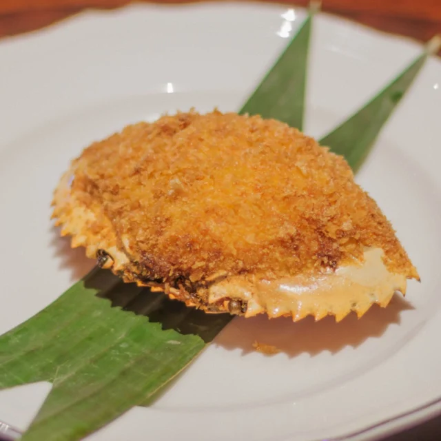 Deep fried crab meat with ribbons of onions, in a crab shell. No. 8 China House